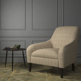 Chair upholstered in a taupe Scottish wool windowpane check fabric