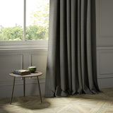 Curtains in a grey Scottish wool windowpane check fabric