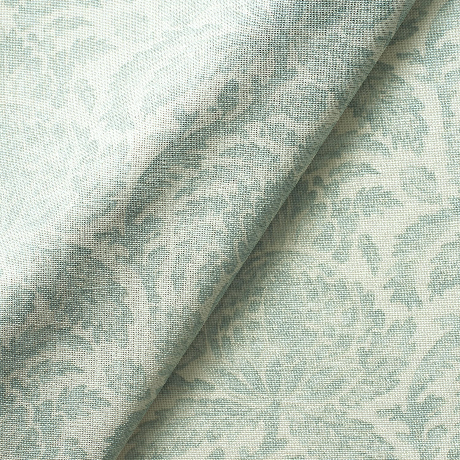 Fabric swatch of a duck egg vintage inspired floral and leaf design fabric for curtains and upholstery