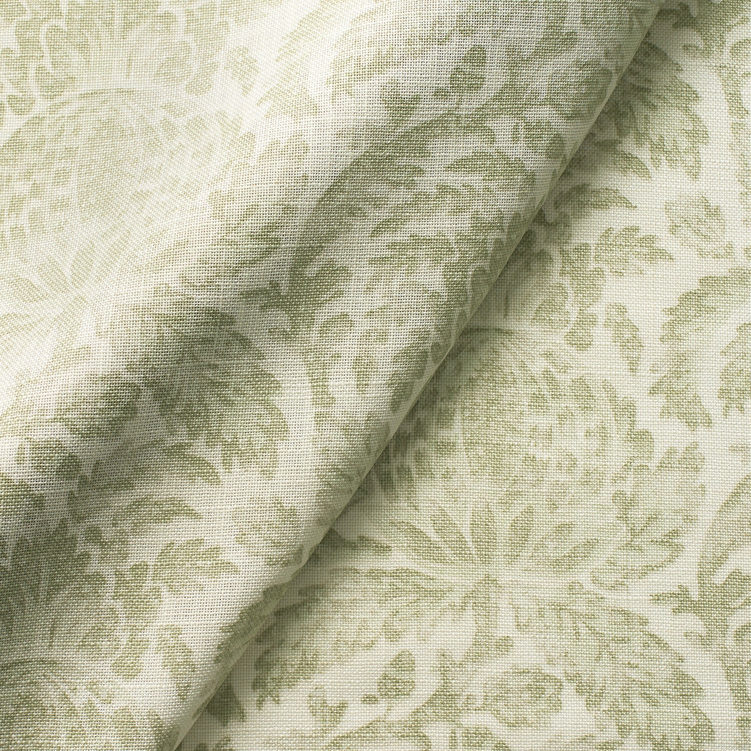 Fabric swatch of a light green vintage inspired floral and leaf design fabric for curtains and upholstery