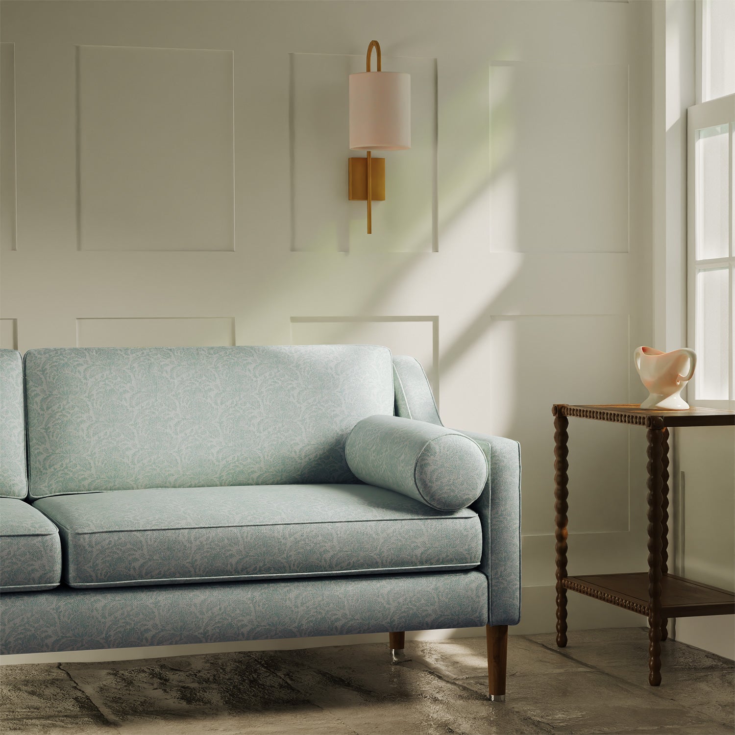 Sofa upholstered in a luxury duck egg floral and leaf fabric