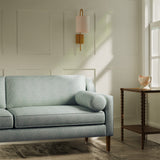 Sofa upholstered in a luxury duck egg floral and leaf fabric