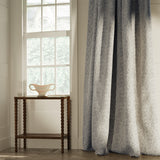 Curtains in a classic lilac floral and leaf fabric