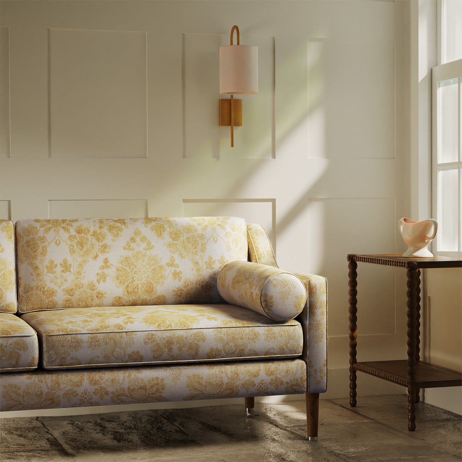 Sofa upholstered in a luxury yellow floral damask fabric