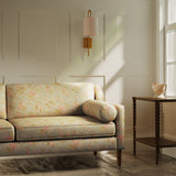 Sofa upholstered in a luxury dark neutral vintage inspired floral fabric