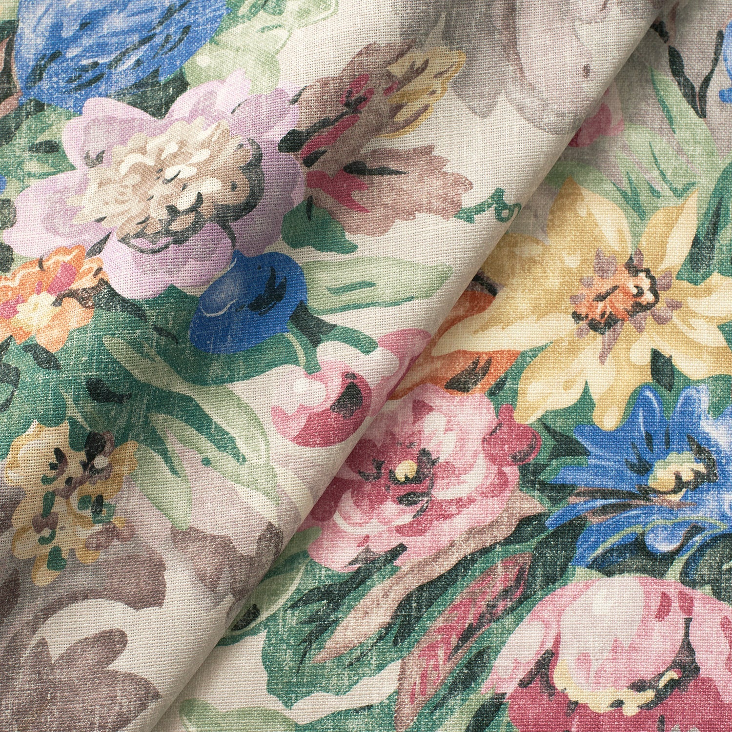 Fabric swatch of a multicoloured floral bouquet design fabric for curtains and upholstery
