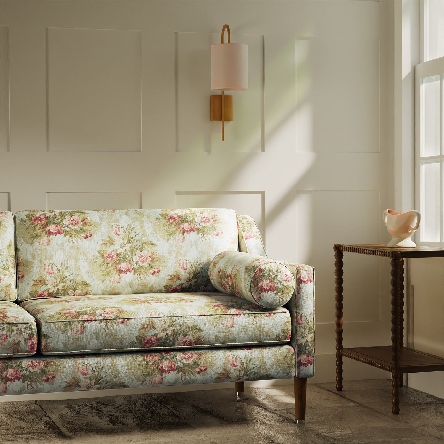 Sofa upholstered in a luxury green and pink floral bouquet fabric