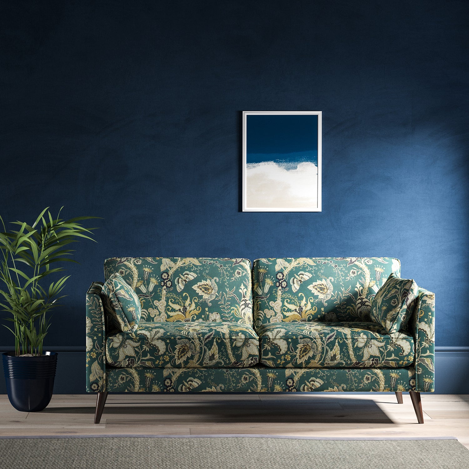 Sofa with a blue fabric with stylised floral design