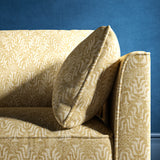 Sofa upholstered in a neutral jacquard weave upholstery fabric