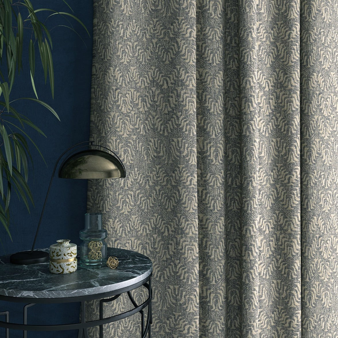 Curtain in a jacquard weave fabric in light blue and neutral colours
