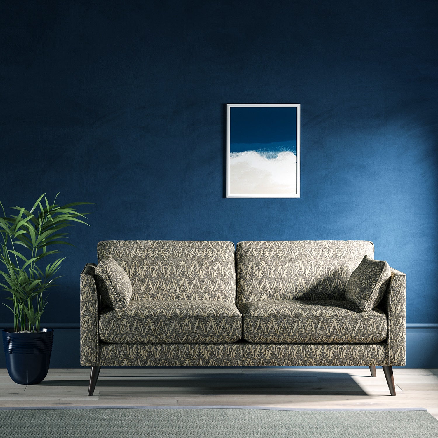 Sofa upholstered in a dark grey and neutral jacquard weave upholstery fabric