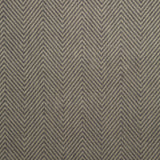 Fabric swatch of a dark grey herringbone weave fabric for curtains and upholstery