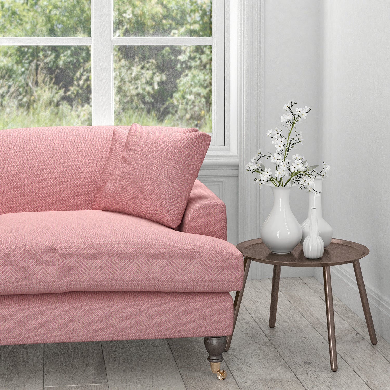 Sofa in a pink fabric with a light geometric woven design