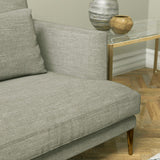 Sofa upholstered in a light grey plain linen blend fabric