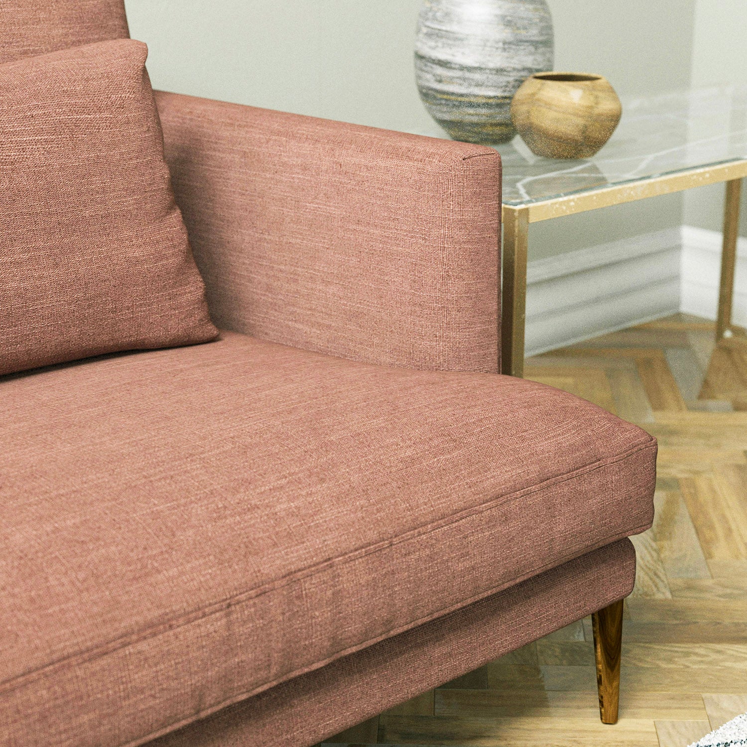 Sofa upholstered in a blush pink linen blend fabric