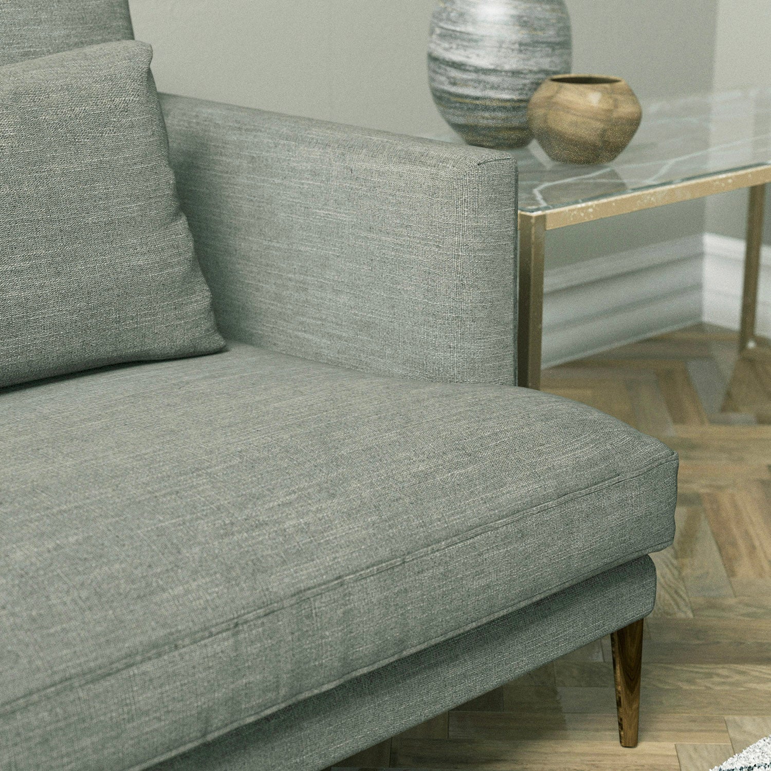 Sofa upholstered in a grey linen mix fabric