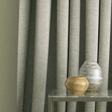 Curtain in a light grey plain linen blend fabric