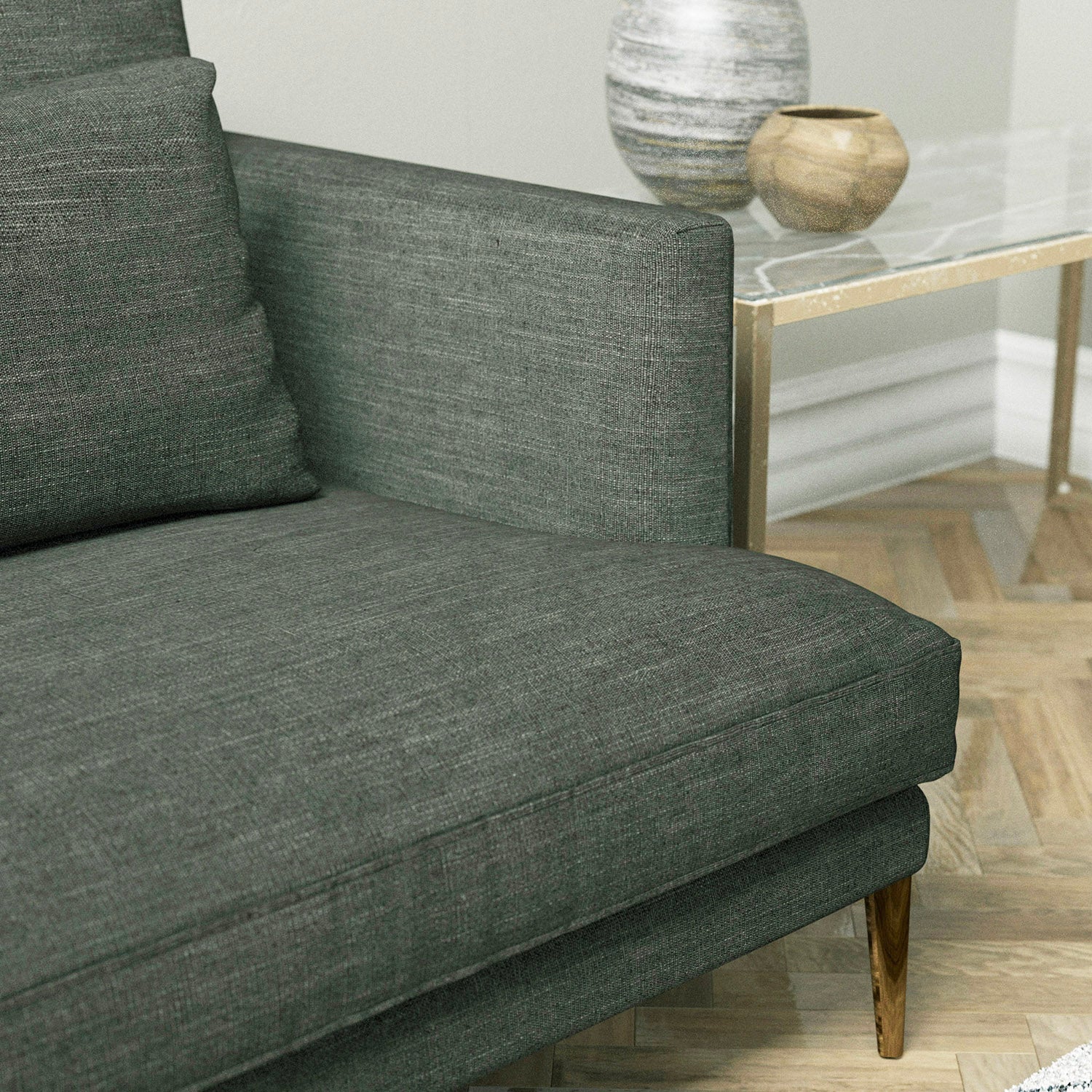 Sofa upholstered in a dark charcoal linen mix upholster fabric