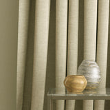 Curtains in a linen coloured plain fabric