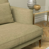 Sofa upholstered in a plain golden beige linen blend fabric