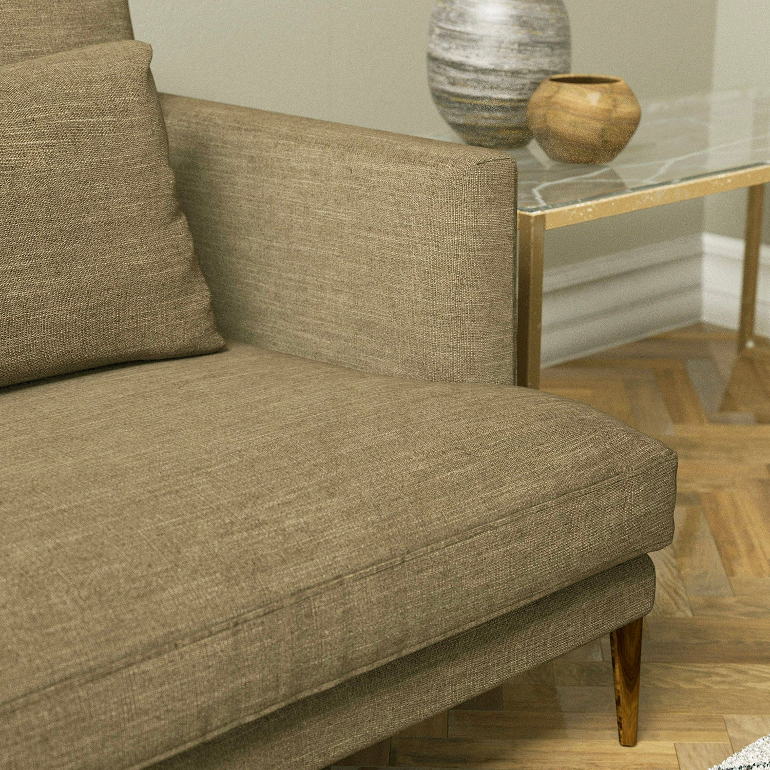 Sofa upholstered in a plain brown linen blend fabric