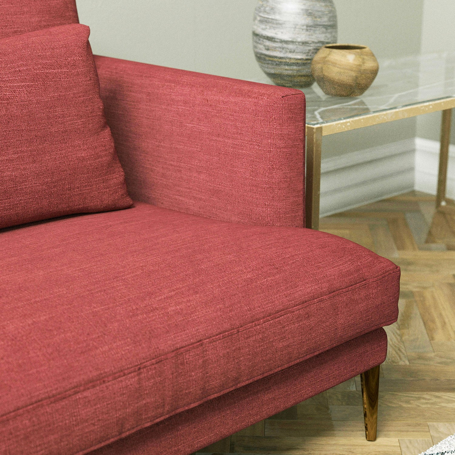 Sofa upholstered in a berry linen blend fabric