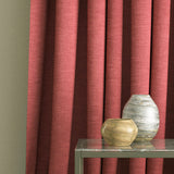 Curtain in a berry coloured linen mix fabric