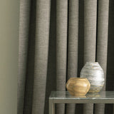 Curtain in a brown linen blend fabric for domestic and contract use