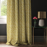 Curtain with a yellow and white geometric print fabric