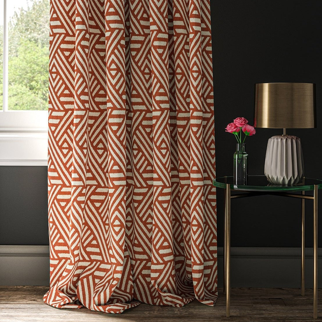 Curtain made with a orange and white geometric print fabric