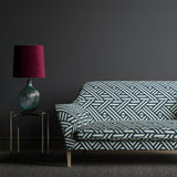 Sofa upholstered in a blue and white large scale geometric print