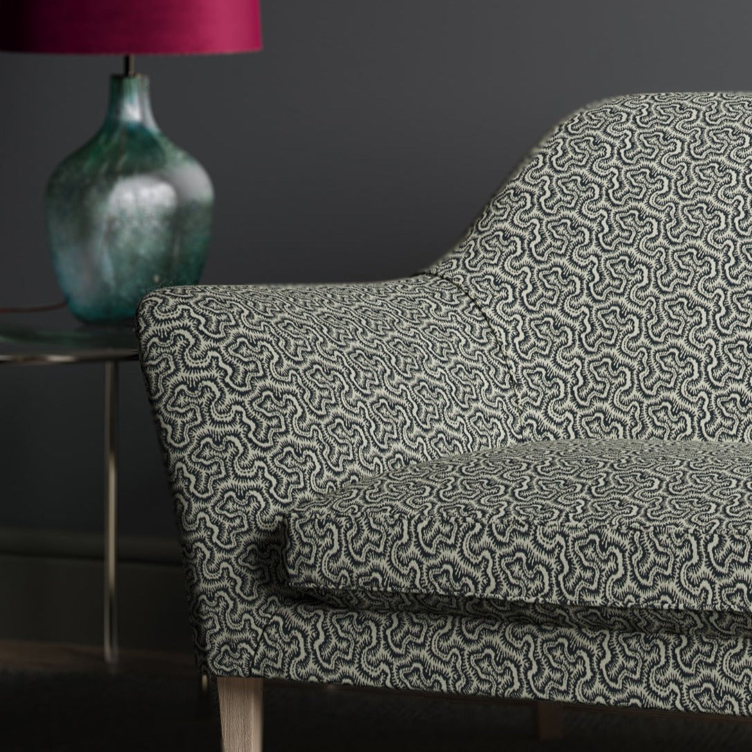 Sofa upholstered in design name Polka, colourway Midnight.