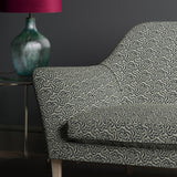 Sofa upholstered in design name Polka, colourway Midnight.