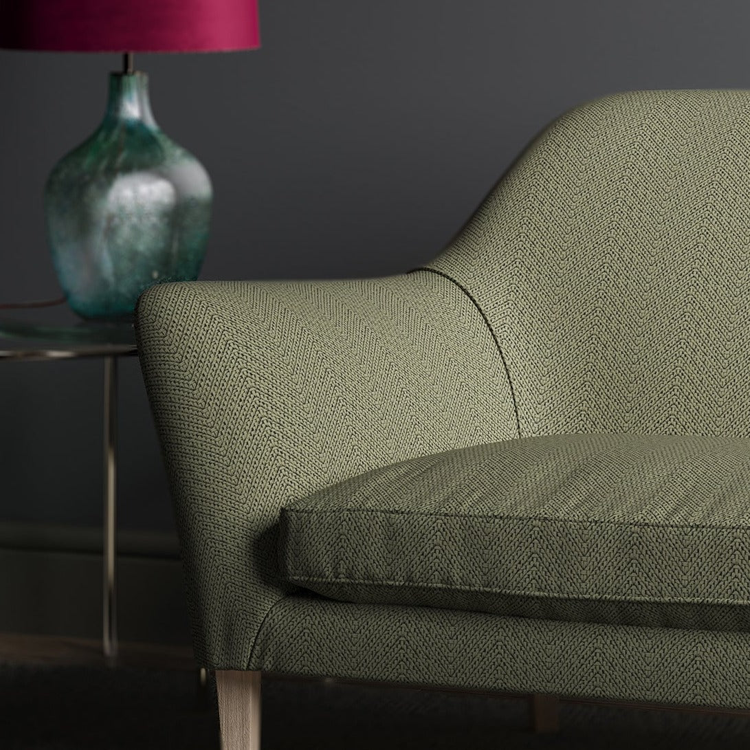 Sofa with a black and neutral geometric fabric.