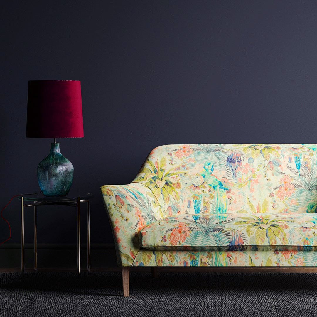 Sofa in a pastel print tropical linen fabric Edit alt text