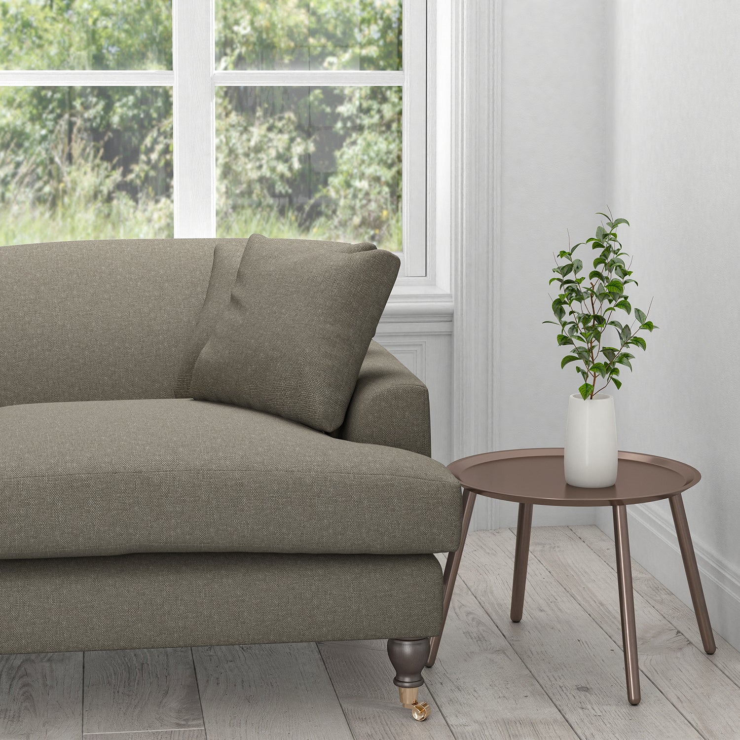 Sofa in a taupe coloured stain resistant fabric for curtains and upholstery