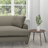 Sofa in a taupe coloured stain resistant fabric for curtains and upholstery