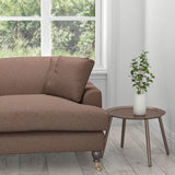 Sofa in a mauve cotton upholstery fabric with a stain resistant finish