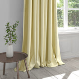 Curtain in a off-white plain cotton furnishing fabric