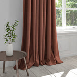 Curtain in a brick red washable plain cotton fabric