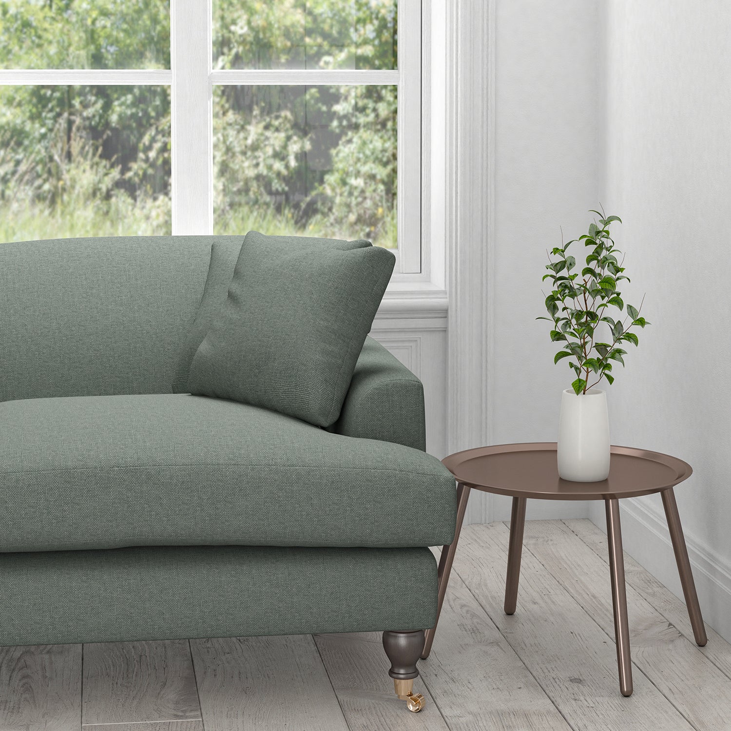 Sofa upholstered in a plain cotton washable aqua furnishing fabric