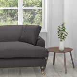 Sofa in a deep purple cotton upholstery fabric with a stain resistant finish