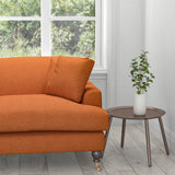 Sofa in a burnt orange colour plain cotton upholstery fabric