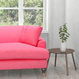 Sofa in a plain candy pink cotton fabric for contract and domestic upholstery