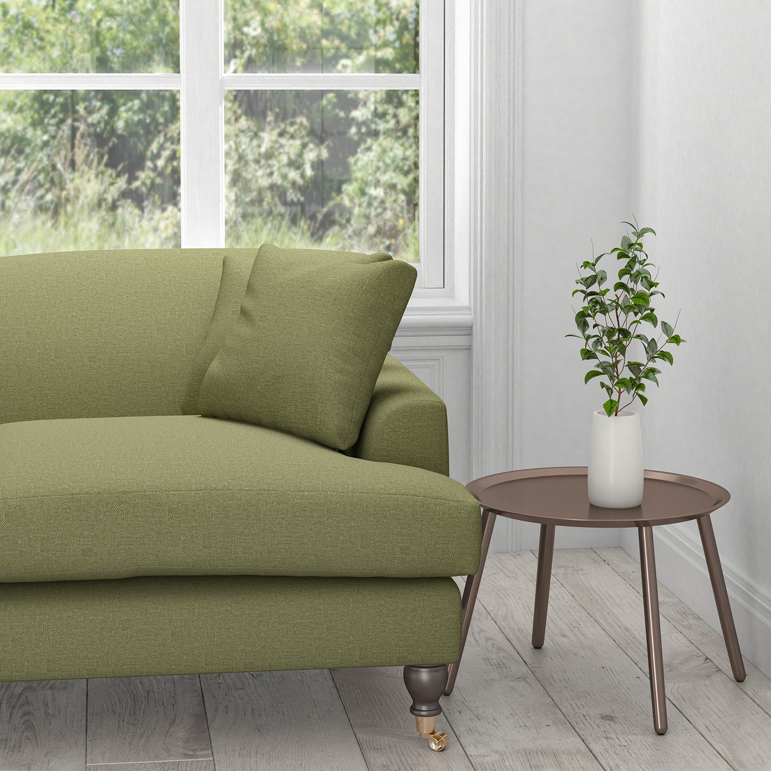 Sofa upholstered in a plain green khaki cotton upholstery fabric
