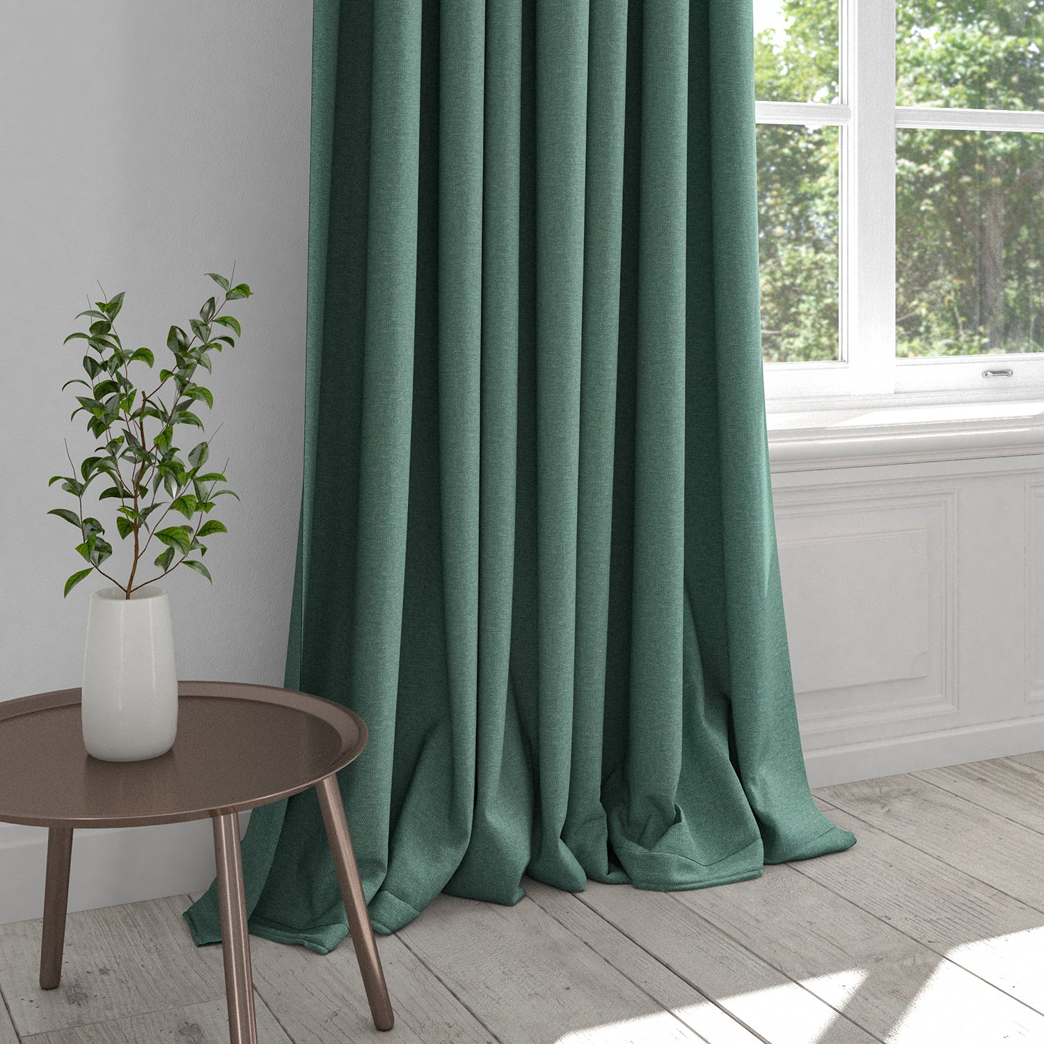 Teal curtain in a plain cotton fabric