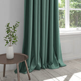 Teal curtain in a plain cotton fabric