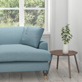 Sofa in a plain powder blue cotton upholstery fabric