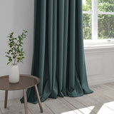 Curtain in a dark blue plain cotton fabric
