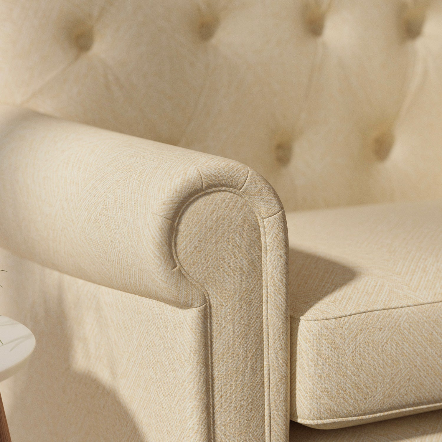 Sofa upholstered in a light yellow Scandi-style semi-plain upholstery fabric with a stain resistant finish